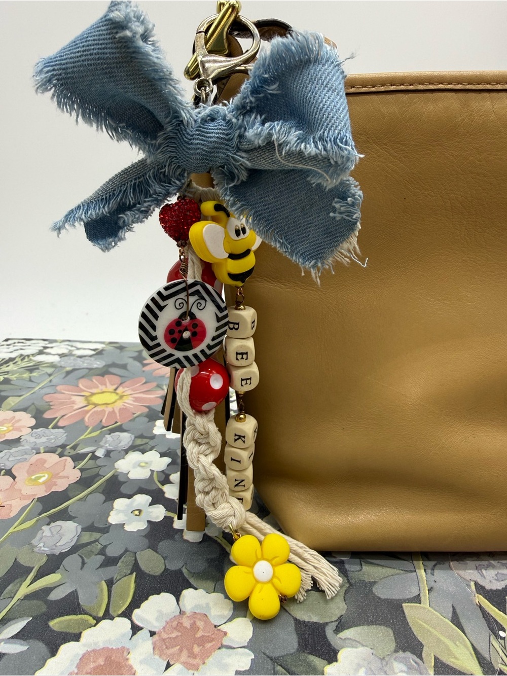 Adorned Crown Jewelry purse bag charm keychain bee kind ladybug macrame bow
